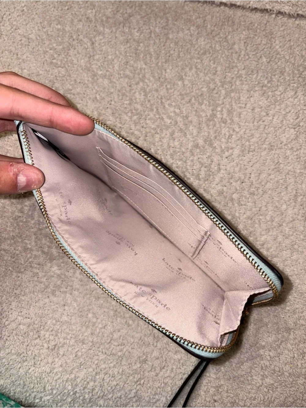 kate spade light blue pebbled leather wristlet phone case